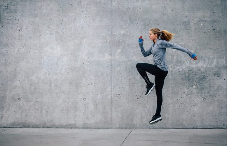 Fit young woman doing cardio interval training