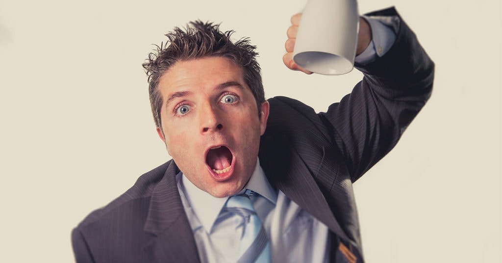 A man looking angry because he has run out of coffee