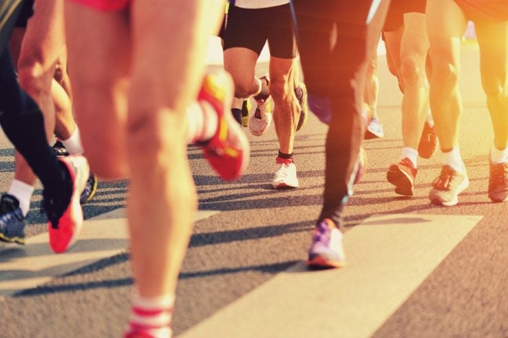 A group of runners running together during a race
