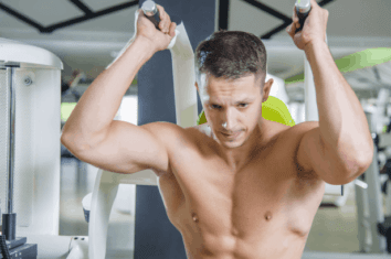 A man doing ab crunches on an ab crunch machine