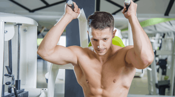 A man doing ab crunches on an ab crunch machine