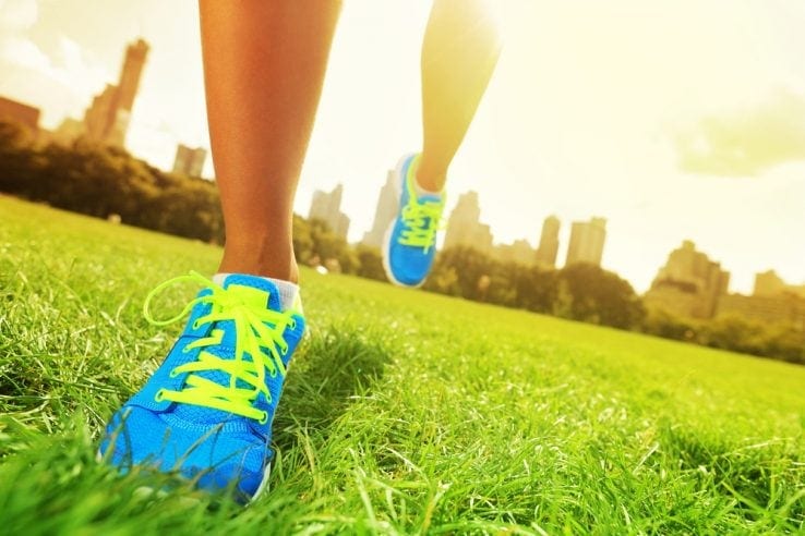 Close up of a woman wearing running shoes