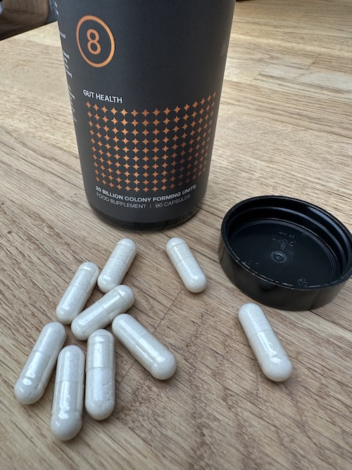 picture showing biotics 8 bottle and capsules