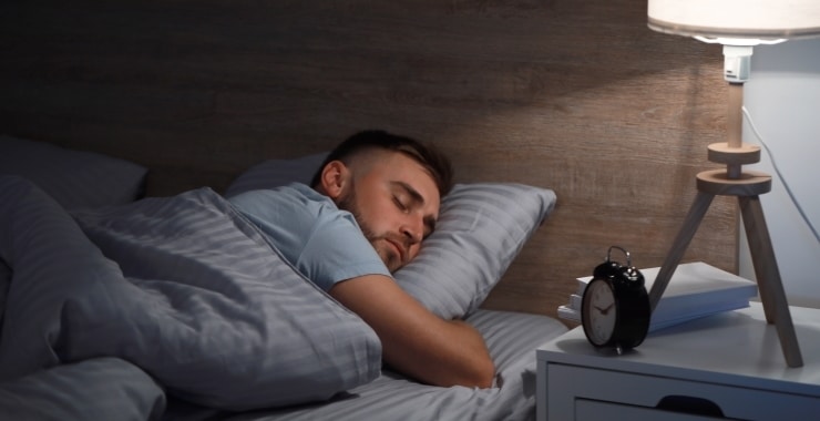 a man sleeping soundly in his room